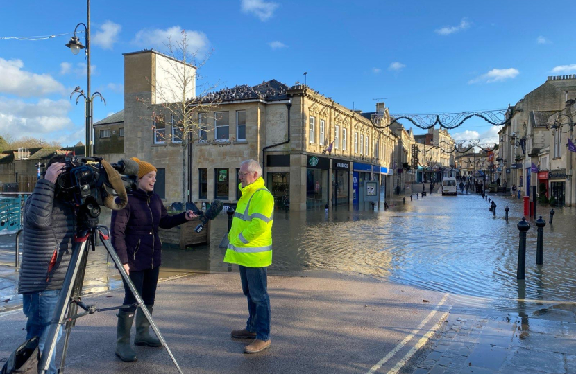 Cllr Nic Puntis being interviewed by ITV News on Chippenham Town Bridge